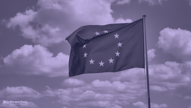 EU flag waving in front of clouds